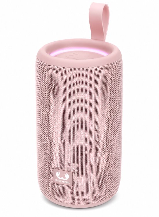 Roze Fresh 'n Rebel speaker met een lichtgevende ring aan de bovenkant en een draaglus.
