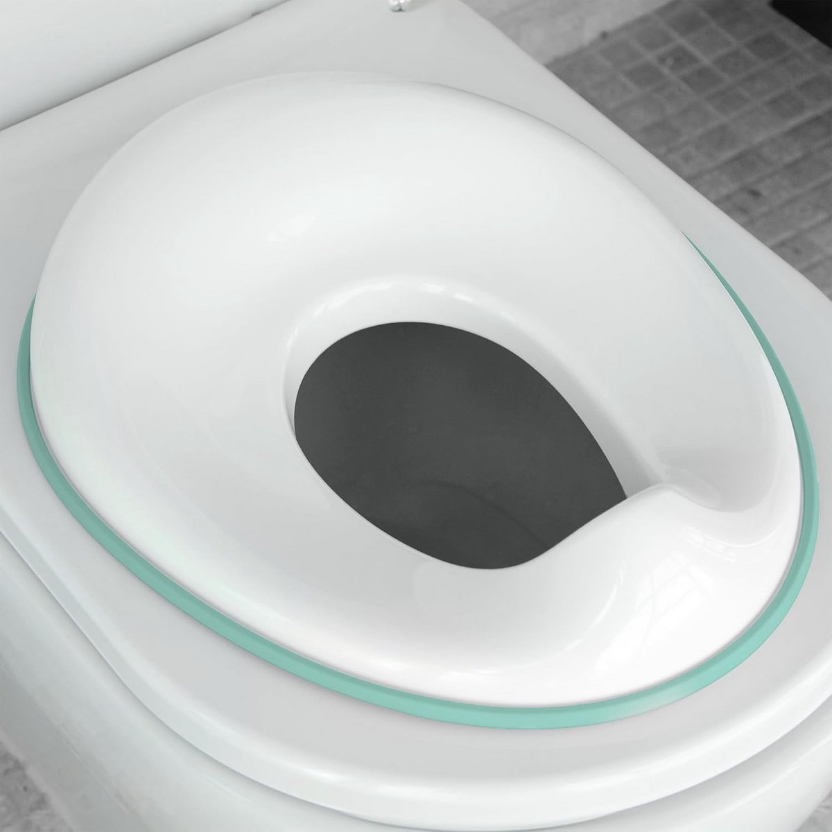 Zindelijkheidstrainingszitje - Potty training seat - Zindelijkheidstraining - Met spatbescherming - 39 x 30 cm - Aqua