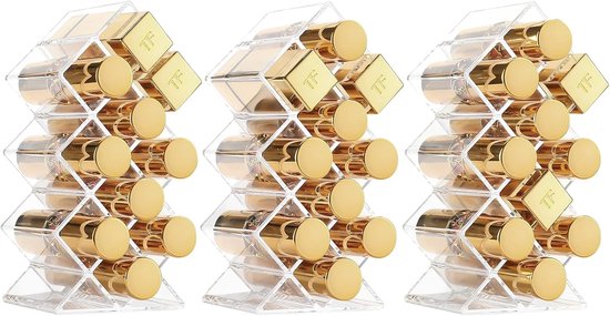 Drie gestapelde lippenhouders, elk met 10 gouden lippenstiften en 'TF'-logo's in een visgraatpatroon.