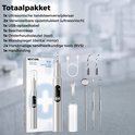 Complete set voor tandsteenverwijdering: ultrasonische tandsteenverwijderaar, opzetstukken, kabel, spiegel en tandheelkundige tools.