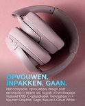 Mauve JLab JBuds Lux ANC koptelefoon, opgevouwen op roze achtergrond.