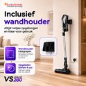 Zwarte steelstofzuiger met muurbevestiging, opgeladen in 4 uur, met tekst 'Inclusief wandhouder'.