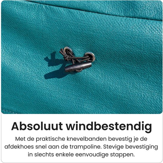 Detail van een groene trampolinehoes met een trekkoord en stopper voor windbestendigheid.