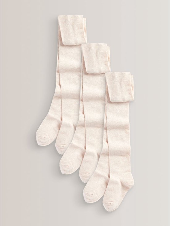 Drie lichtroze katoenrijke maillots met omgeslagen boorden, op een lichte achtergrond.