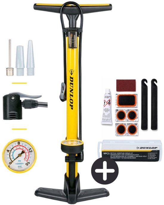 Gele Dunlop fietspomp met drukmeter, een reparatieset en adapters.