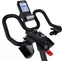 Close-up van het stuur en display van een zwarte Fit Bike Race Magnetic Pro spinfiets.