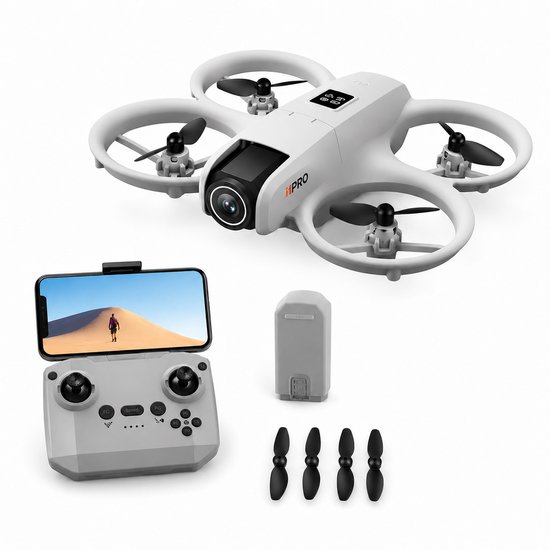 Witte drone met afstandsbediening en smartphone, inclusief reserveonderdelen.