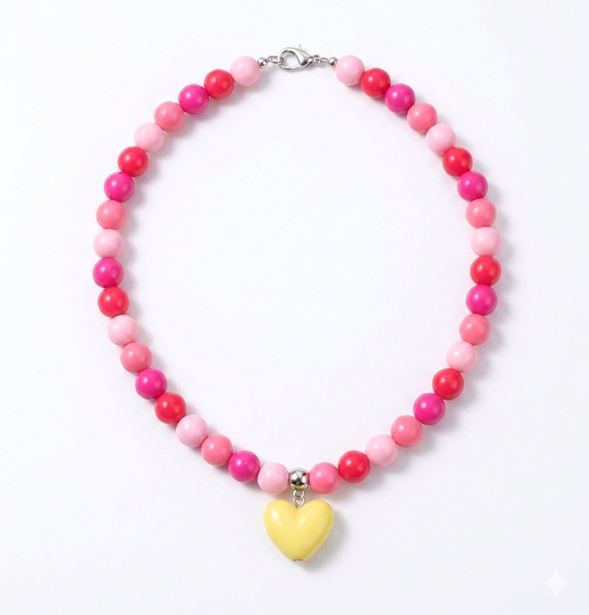 She life style - Een trendy, nieuwe, kleurrijke kralen ketting met een uniek hartvormig hanger - Roze/Fuchsia - Geel hart