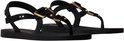 Zijprofiel van zwarte Ipanema slippers met gouden gespen en verstelbare bandjes.
