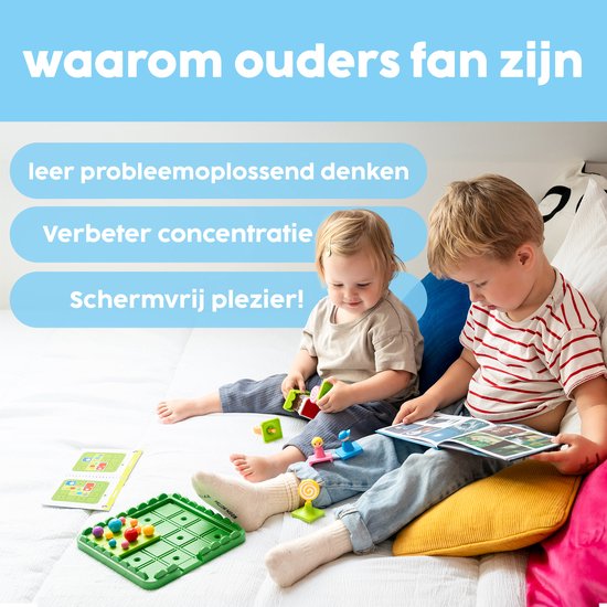 Twee kinderen spelen op een wit bed met het spel Hans & Grietje. Een kind leest een boekje met opdrachten.