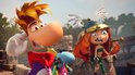 Rayman en Barbara met engelenvleugels kijken verrast in de camera, met Globox erachter.