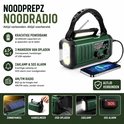 Groene noodradio met zaklamp, zonnepaneel en slinger. 10.000 mAh powerbank met AM/FM-radio.