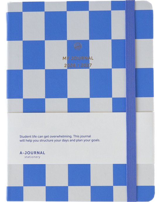 Een A5-agenda met een paars-wit dambordpatroon, met de tekst 'MY JOURNAL 2026 / 2027' en een paarse elastische band.