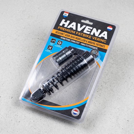 Havena premium fatbike vering in verpakking, met zwarte schokdemper met carbonlook en metaal.