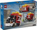Doos LEGO City snackbartruck. Rode truck met zwarte cabine, frietjes bovenop en 'FRIES' logo.