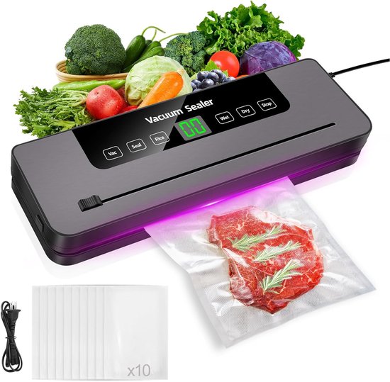 Scelleuse sous vide noire avec bifteck emballé sous vide, lot de 10 sacs vides et divers légumes frais.