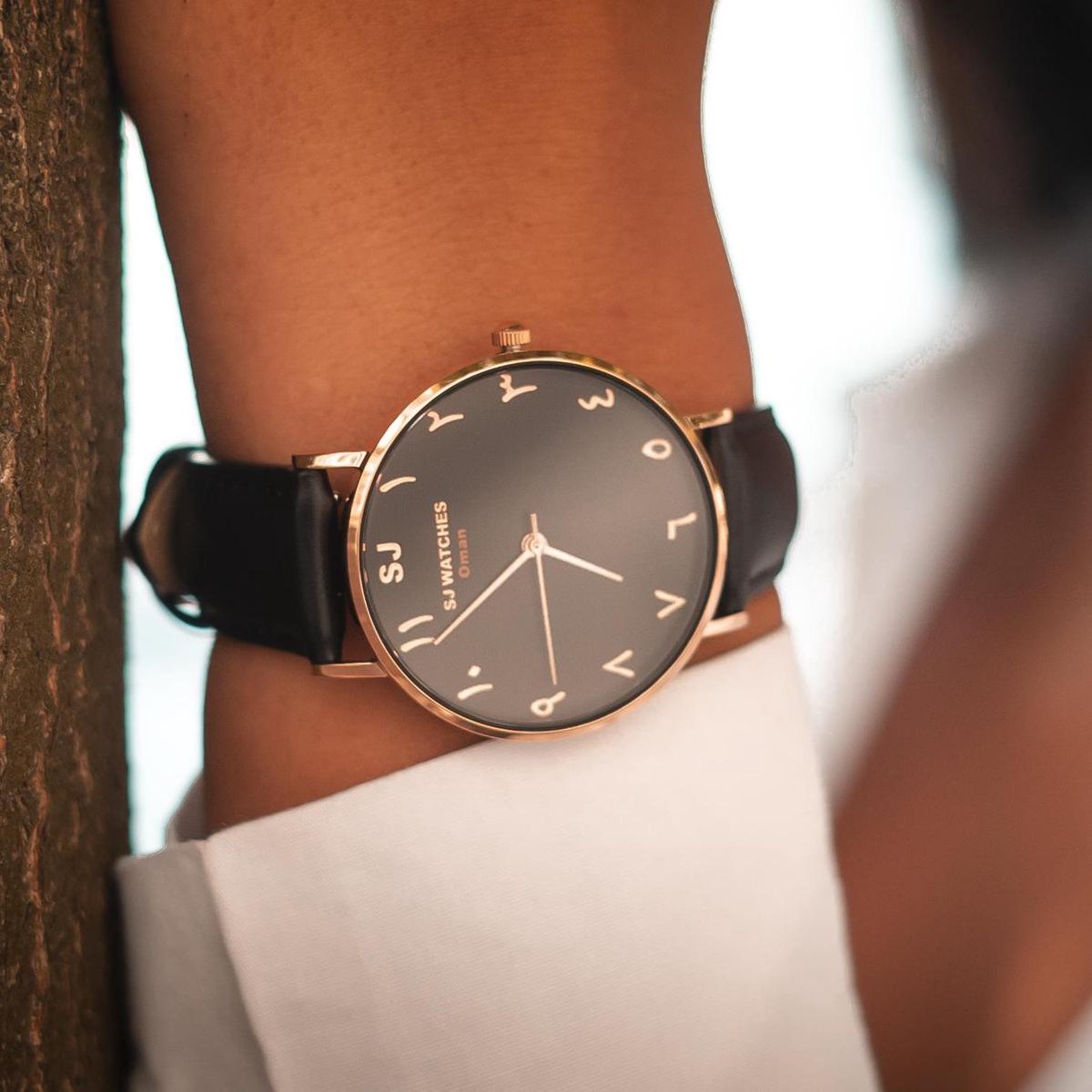 Montre SJ WATCHES Oman pour femme en or noir et rose et chiffres
