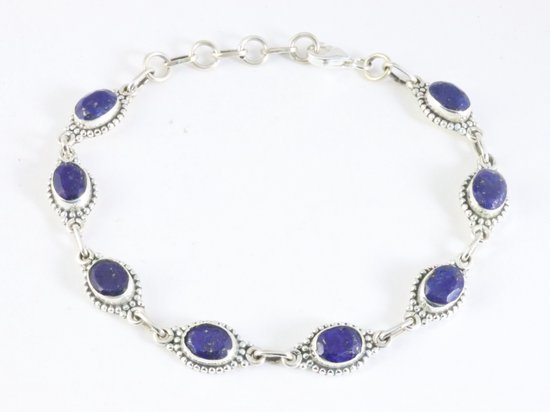 Bracelet en argent décoré avec saphir bleu
