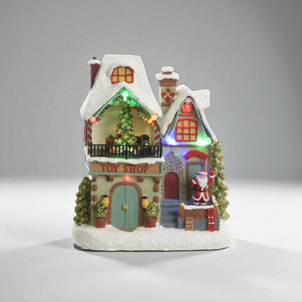 Handgeschilderd kersthuisje 'Toyshop' met LED & beweging – 18 cm hoog