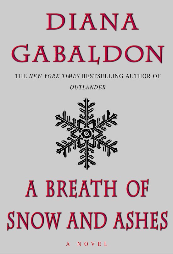 Boek "A Breath of Snow and Ashes" van Diana Gabaldon met een zwart sneeuwvlok symbool.