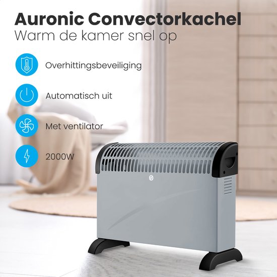 Grijze Auronic convectorkachel met functies: oververhittingsbeveiliging, automatische uitschakeling, ventilator en 2000W vermogen. In een woonkamer.