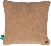 Vierkant, beige teddy warmtekussen met een klein Qnuss-label en een zwarte aan-uitknop.