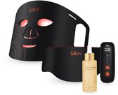 Zwart Silk'n LED-gezichtsmasker en halsstuk, met losse controller en een flesje Silk'n Builder serum.