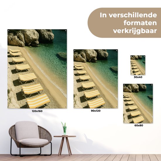 Tuinposter 90x120 cm - Tuindecoratie Strandbedden - Zee - Stenen - Baai - Poster voor in de tuin - Buiten decoratie - Schutting tuinschilderij - Tuindoek muurdecoratie - Wanddecoratie balkondoek