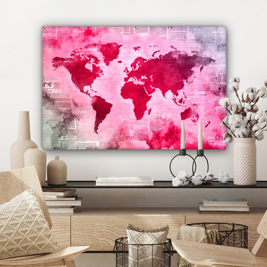 Wereldkaart avec peinture rose vif sur fond avec journal 90x60 cm