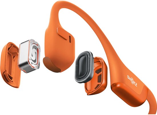 Gedemonteerde oranje Shokz OpenRun Pro 2 koptelefoon, met drivers.