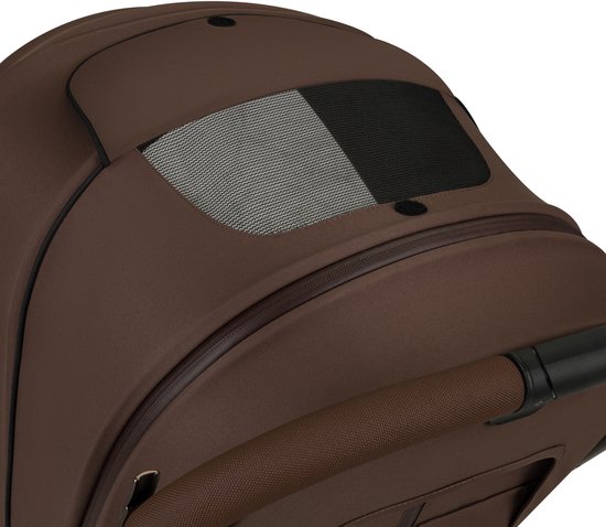 Detail van een bruine kinderwagenkap met ventilatie.
