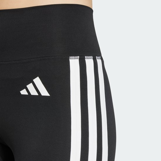 Zwarte legging met aan de zijkant het witte Adidas logo en drie witte strepen