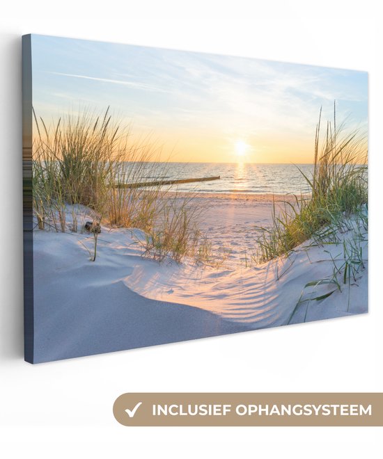 Coucher de soleil sur la mer des Wadden avec dunes et herbes, système de suspension inclus.