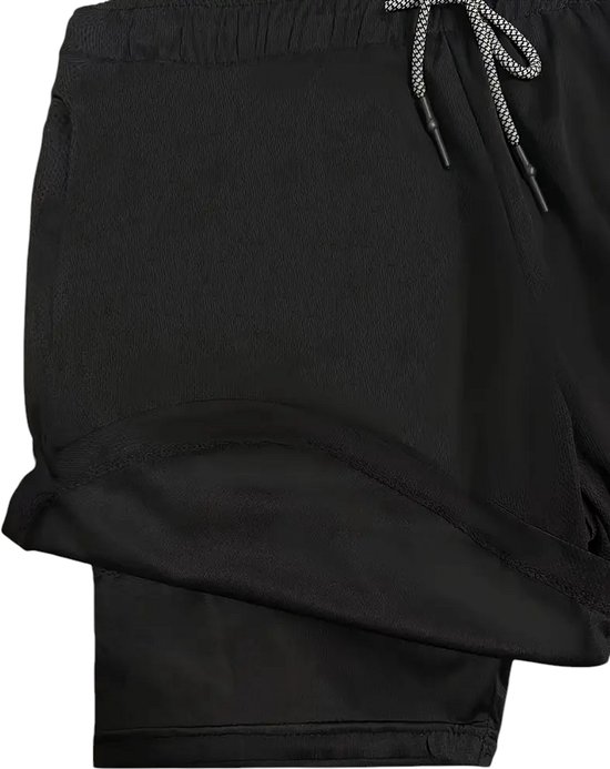 Short de sport noir à double couche avec un cordon visible contrastant.
