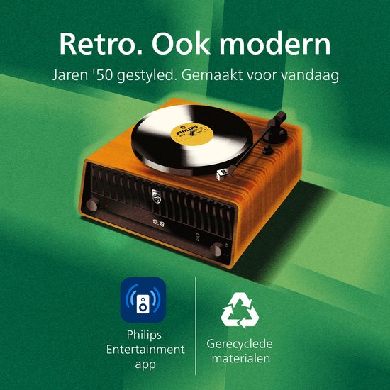 Retro platenspeler in oranje uitvoering met een draaiende plaat.