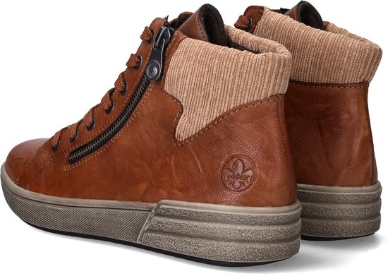Cognackleurige leren dames sneaker met rits en corduroy boord.