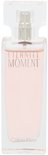 Flacon de Calvin Klein Eternity Moment Eau de Parfum au liquide rose pâle.