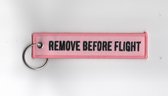 REMOVE BEFORE FLIGHT - Aviation Tag - Roze - Zwarte letters