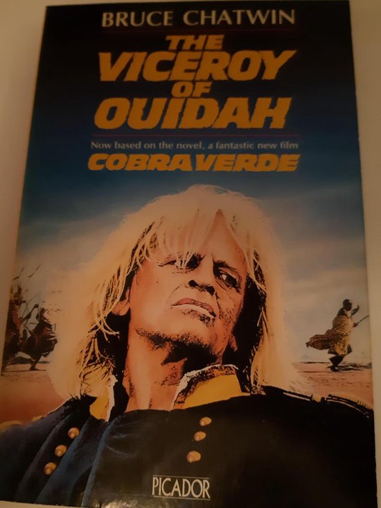 Boekomslag van 'The Viceroy of Ouidah' met een portret van een man met lang blond haar, "COBRA VERDE" staat er in gele letters.