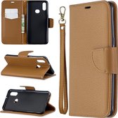 Voor Galaxy A10s litchi textuur pure kleur horizontale flip pu lederen tas met houder & kaartsleuven & portemonnee & lanyard (bruin)