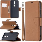 Voor Nokia 2.4 Litchi Textuur Pure Kleur Horizontale Flip Leren Case met Houder & Kaartsleuven & Portemonnee & Lanyard (Bruin)