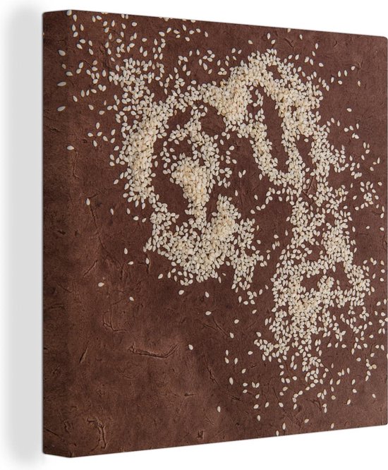 Surface marron avec des graines de sésame réparties sur la table Toile 20x20 cm - petit - Tirage photo sur toile (Décoration murale salon / chambre)