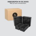 Zwarte opbergboxen met binnenvakken en een kartonnen doos met het Buxibo logo.