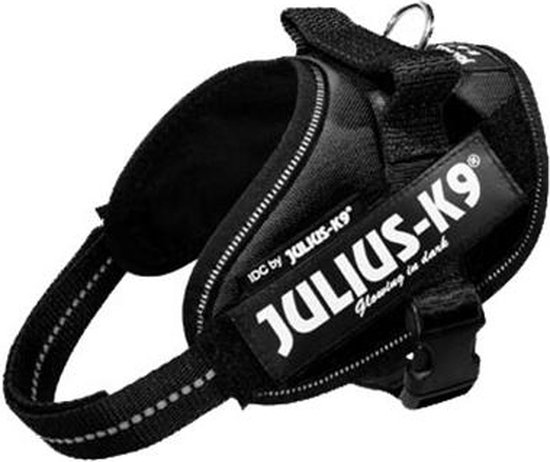 Zwart IDC Julius-K9 hondentuig met reflecterende randen en "Glowing in dark" opdruk.