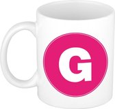 Mok / beker met de letter G roze bedrukking voor het maken van een naam / woord of team