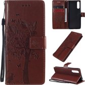 Voor Sony Xperia 10 II Tree & Cat reliÃ«fpatroon Horizontale flip lederen tas met houder & kaartsleuven & portemonnee & draagkoord (koffie)