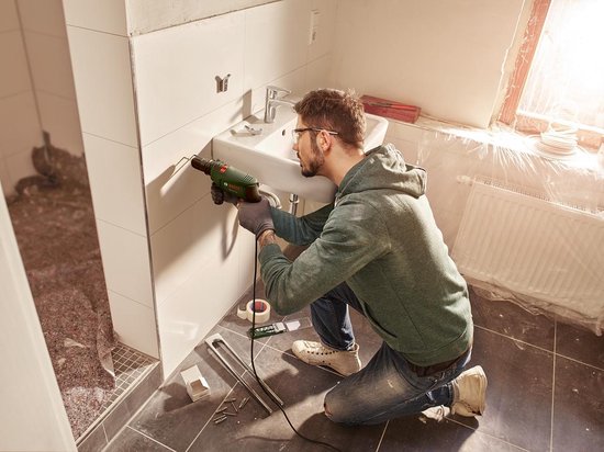 Perceuse à percussion Bosch EasyImpact 600 - 600 Watt - Incl. butée de profondeur et poignée supplémentaire