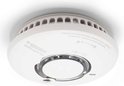 Wi-Safe 2 FireAngel rookmelder op een plafond, met ventilatiegaten en 'TEST/AV' aanduiding.