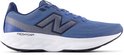 Blauwe New Balance sportschoen met witte zool en grijs 'N' logo.