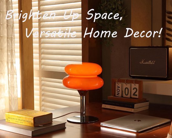 Oranje glazen mushroom tafellamp met chromen voet. "Brighten Up Space, Versatile Home Decor!"